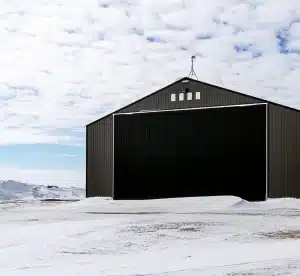 A post-frame machine shed built by Integrity Post Structures in winter